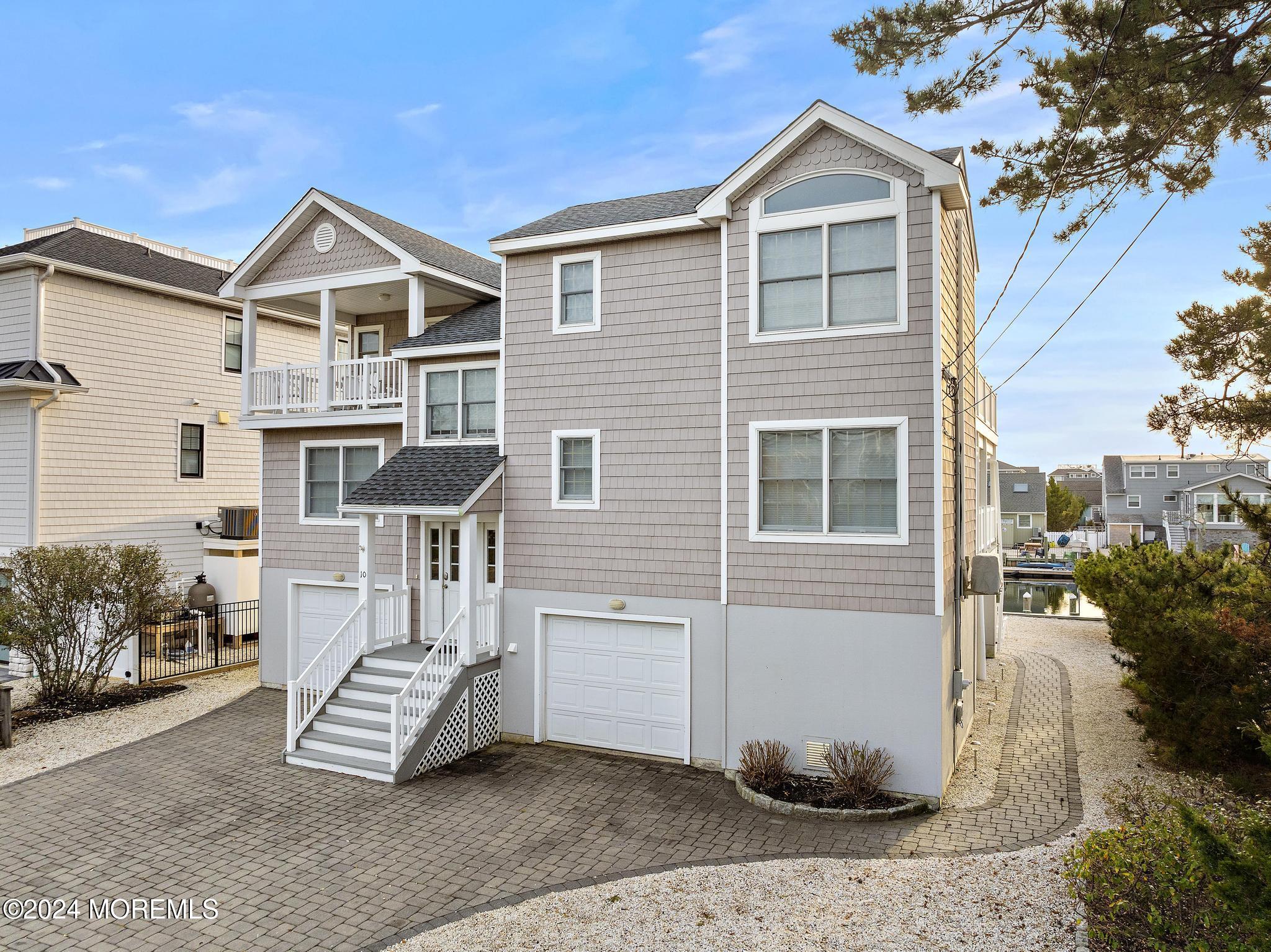 10 Arnold Boulevard Beach Haven, NJ 08008 - Photo 76 of 81 a front view of a house with a yard