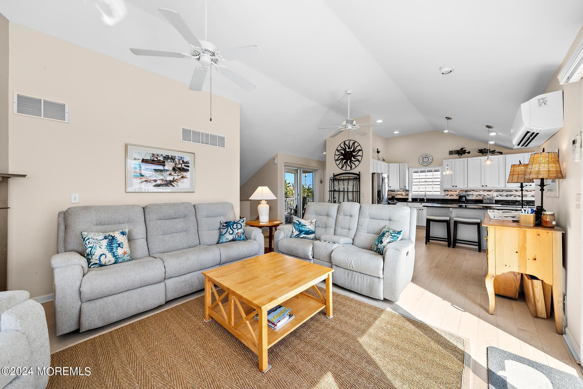 10 Arnold Boulevard Beach Haven, NJ 08008 - Photo 8 of 81 a living room with furniture and kitchen view
