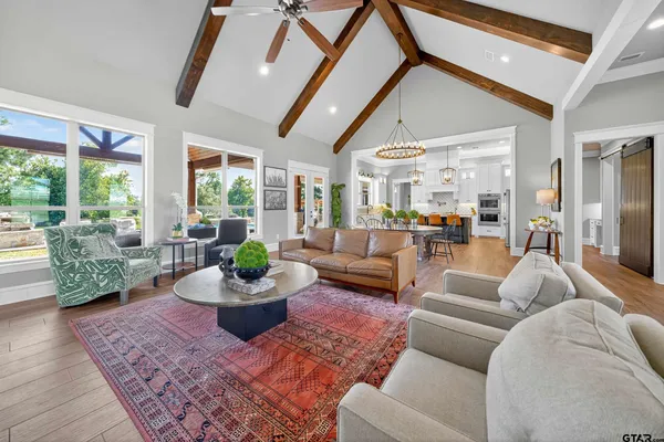 a living room with furniture and a view of living room
