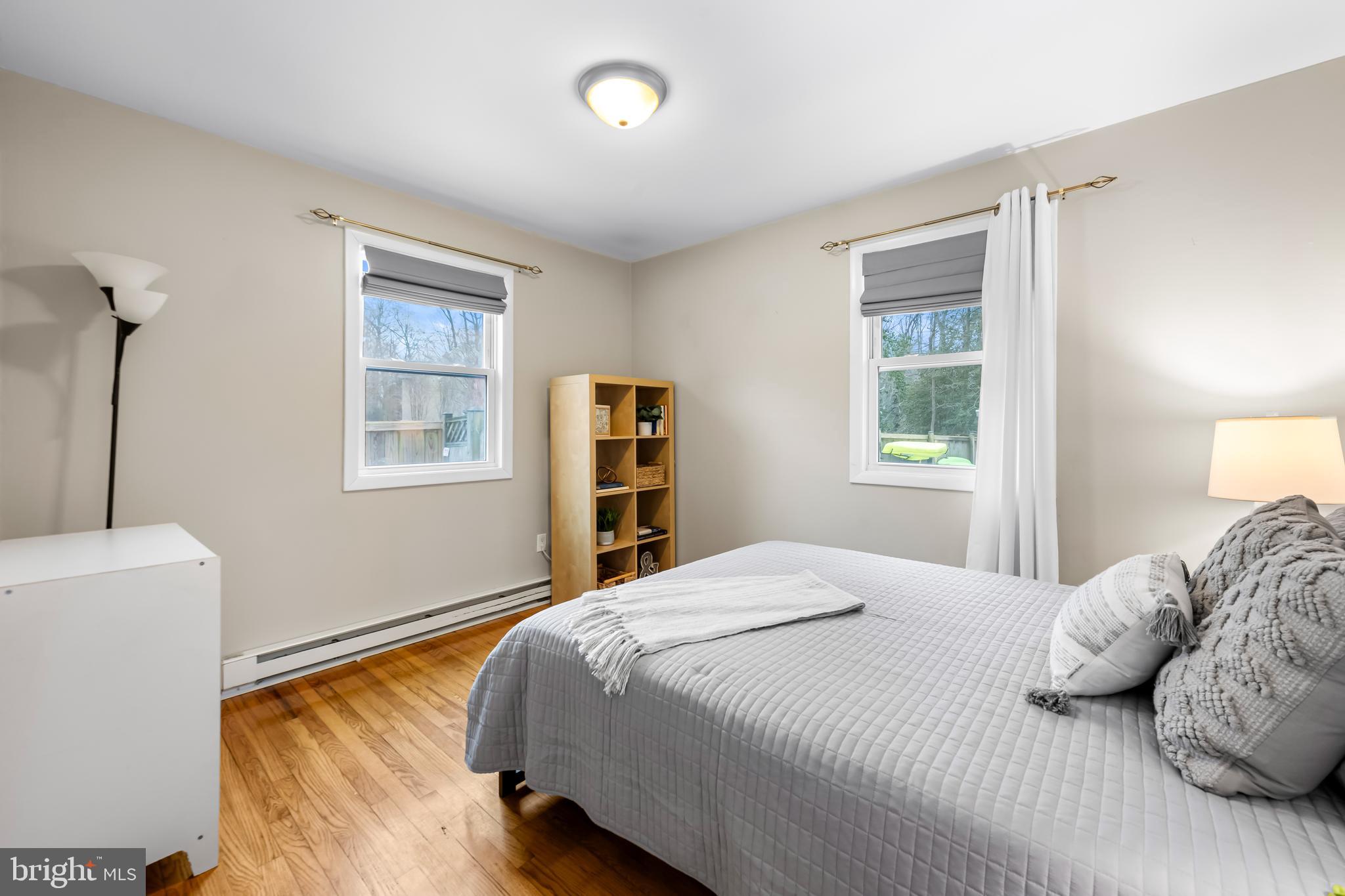 127 Cresston Road Arnold, MD 21012 - Photo 17 of 32 a bedroom with a bed and a window