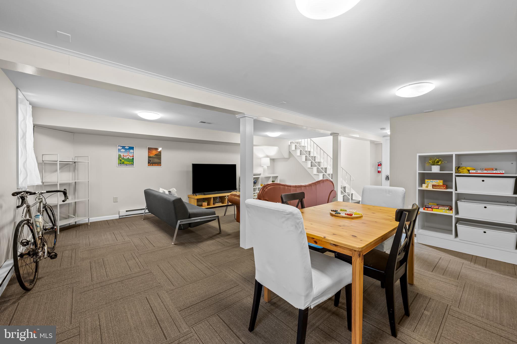 127 Cresston Road Arnold, MD 21012 - Photo 25 of 32 a living room with furniture a flat screen tv and a table