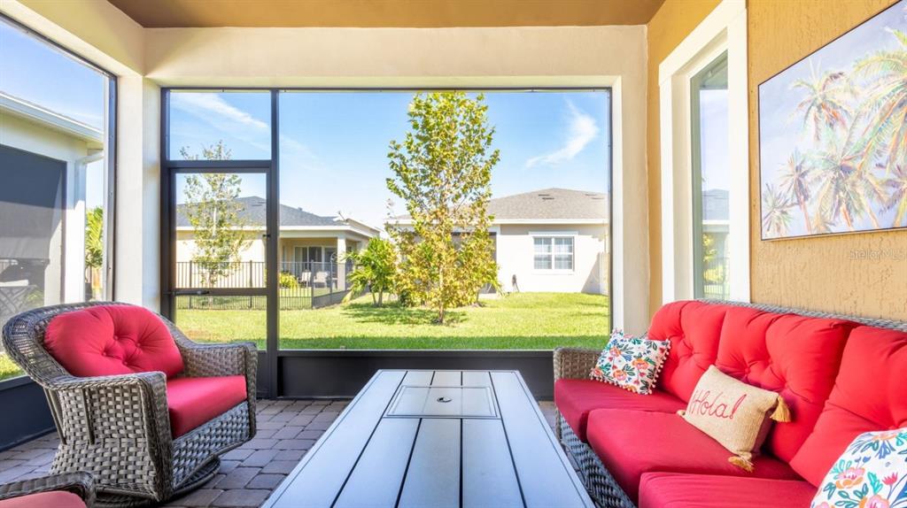 2278 Datura Loop St. Cloud, FL 34772 - Photo 27 of 31 a living room with furniture and a large window
