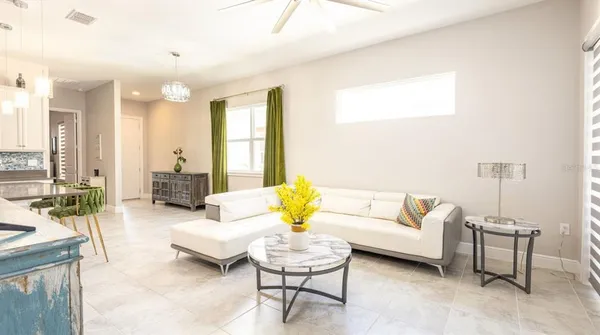 a living room with furniture and a couch