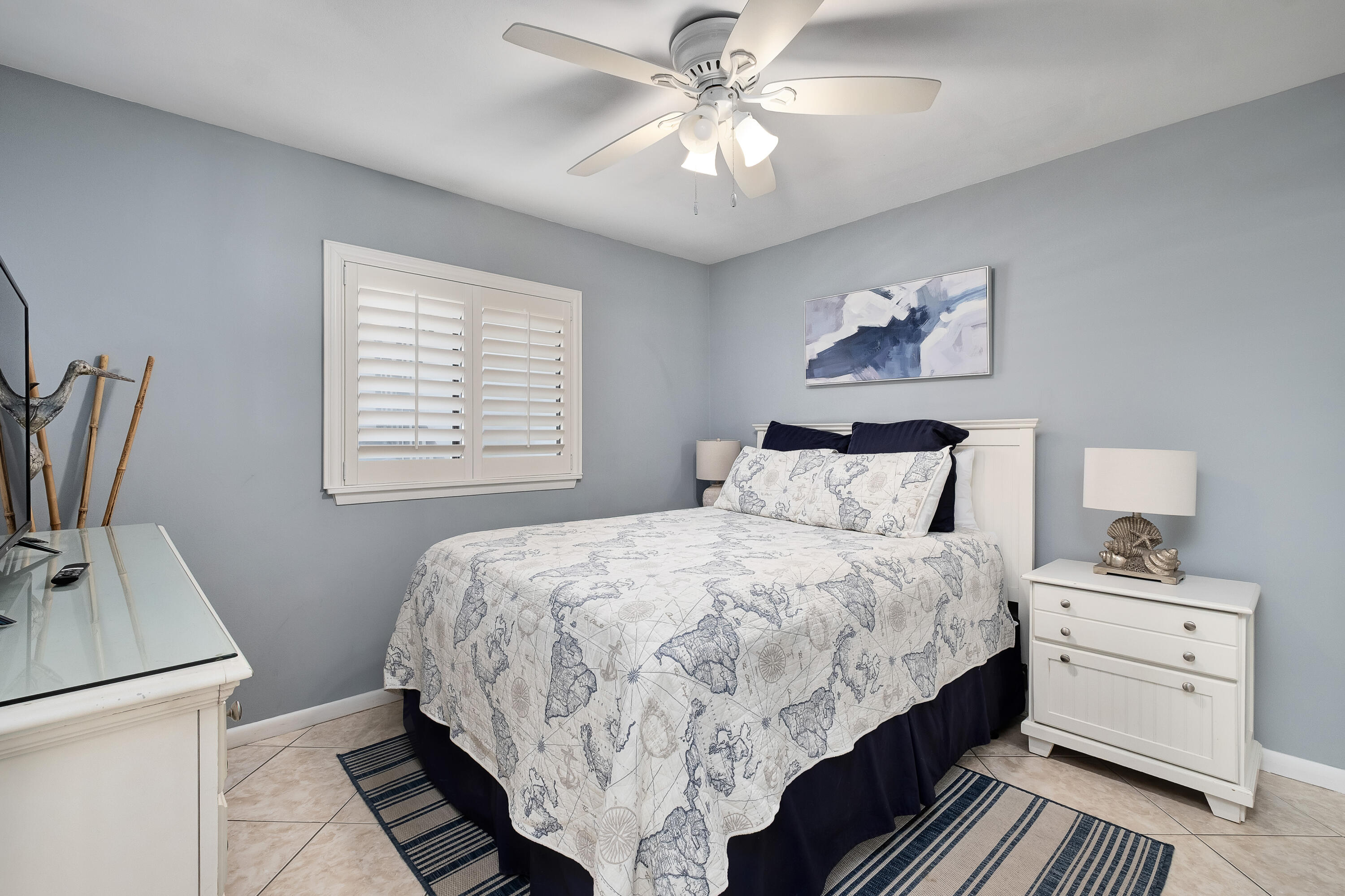 4100 East County Highway 30A, Unit 902 Santa Rosa Beach, FL 32459 - Photo 20 of 54 a bed room with a bed and a chandelier