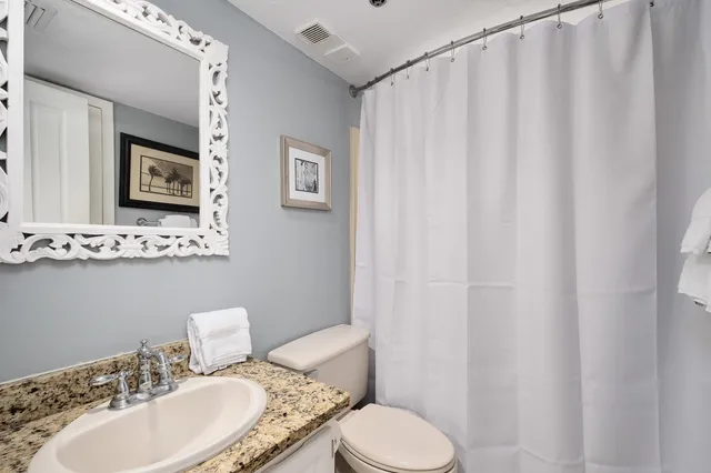 a view of a balcony with chair