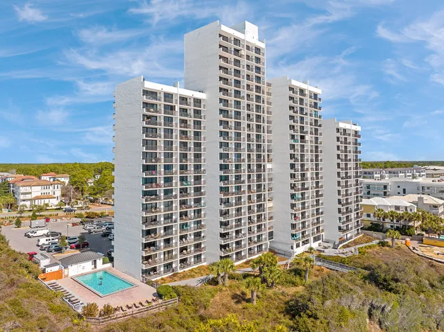 a view of a city with an ocean view