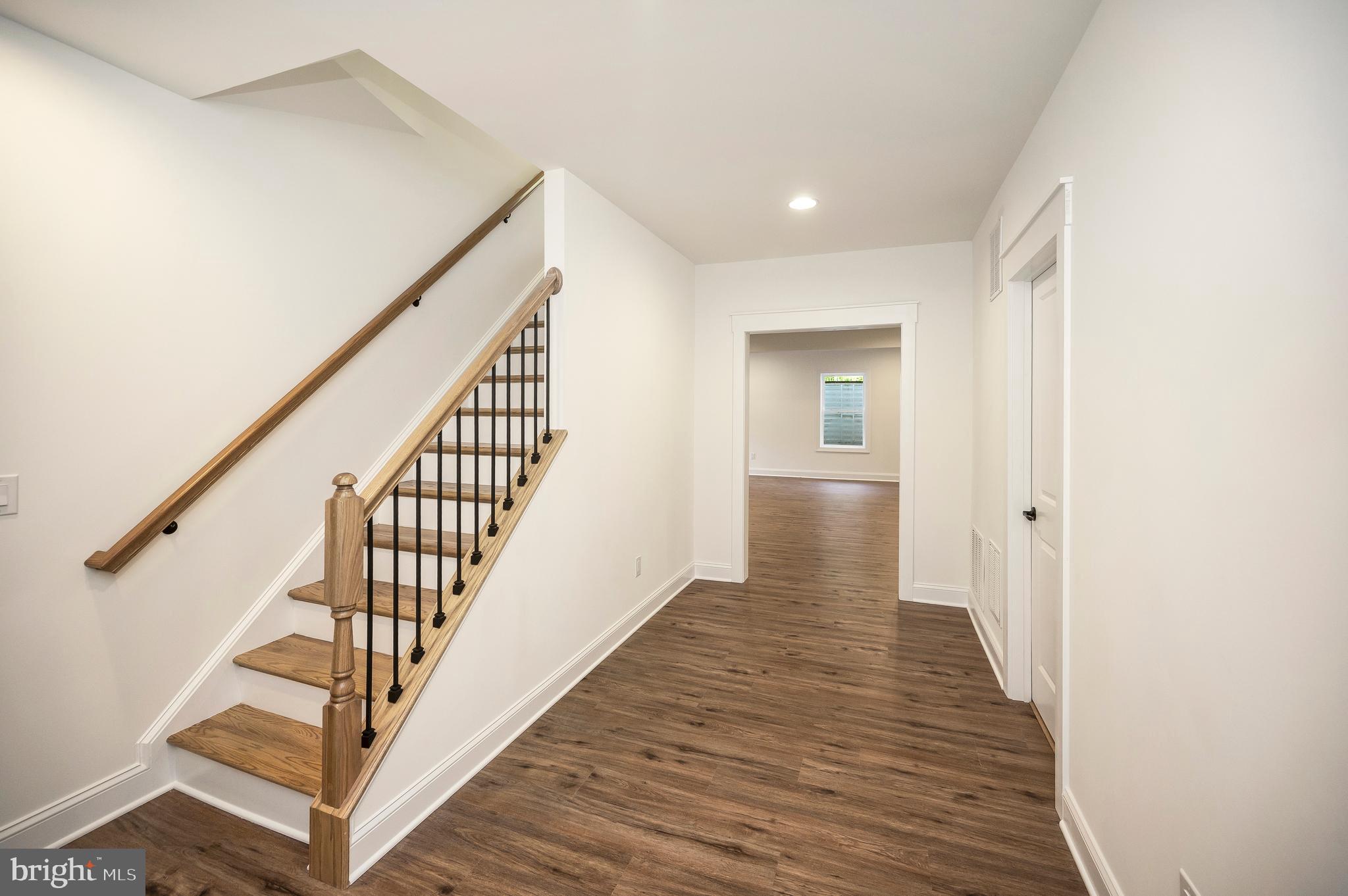 13208 Bristow Road Nokesville, VA 20181 - Photo 52 of 58 Oak staircase to lower level