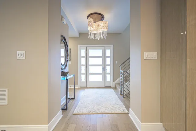 a view of entryway with a front door