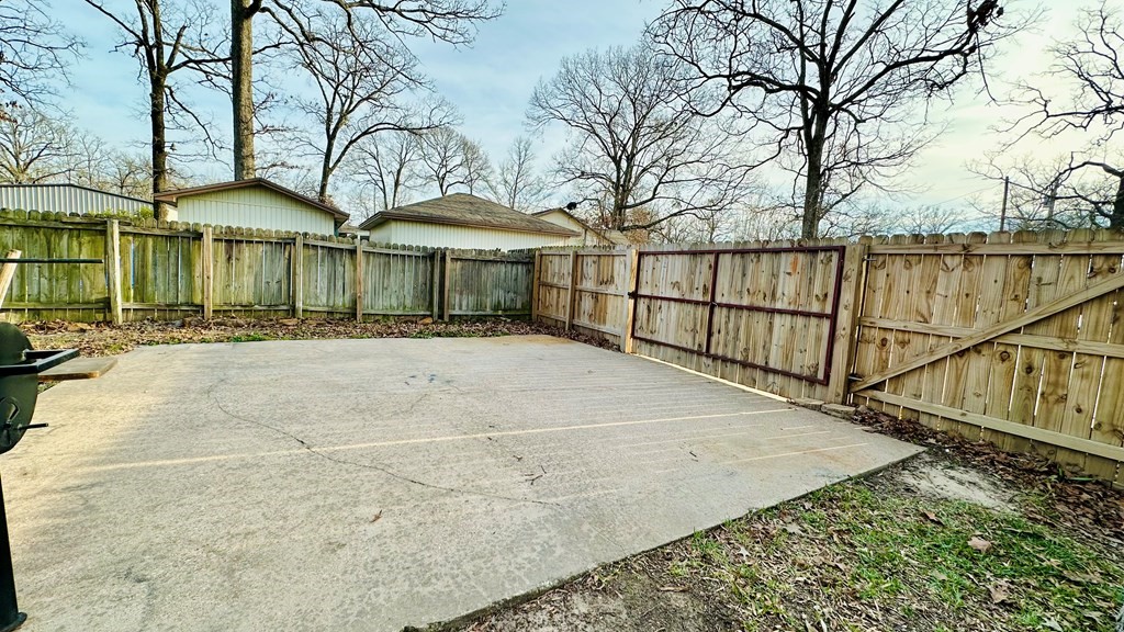 235 Spring Branch Street Lufkin, TX 75904 - Photo 29 of 30 a front view of a house with a garden