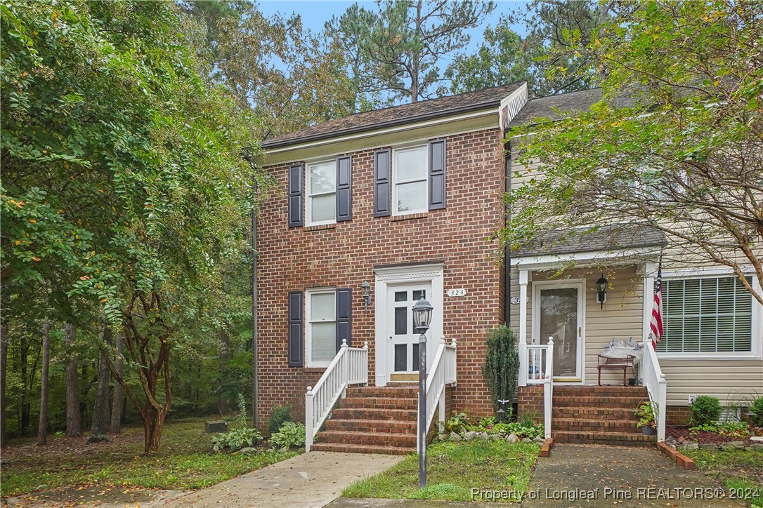 324 Olde Towne Drive Sanford, NC 27330 - Photo 1 of 29 front view of house with a yard