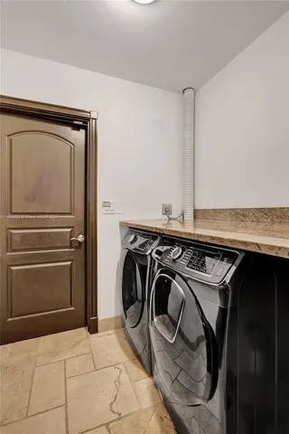 a front view of a house with lake view