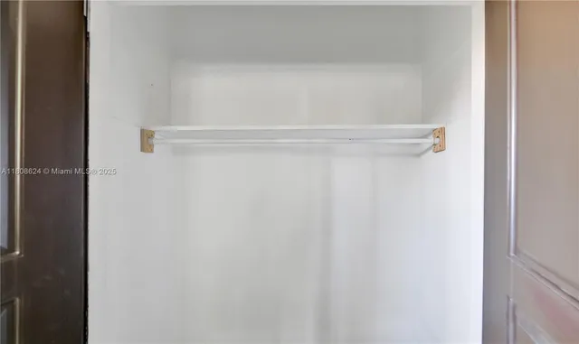 an aerial view of a house with outdoor space