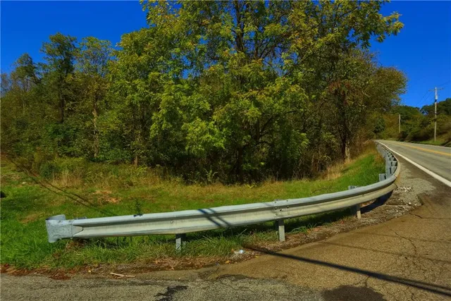 a small pool sitting in the middle of a lake
