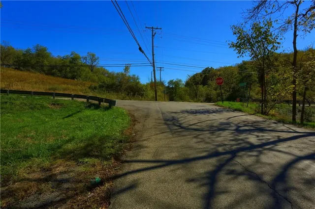 a view of a field with an outdoor space