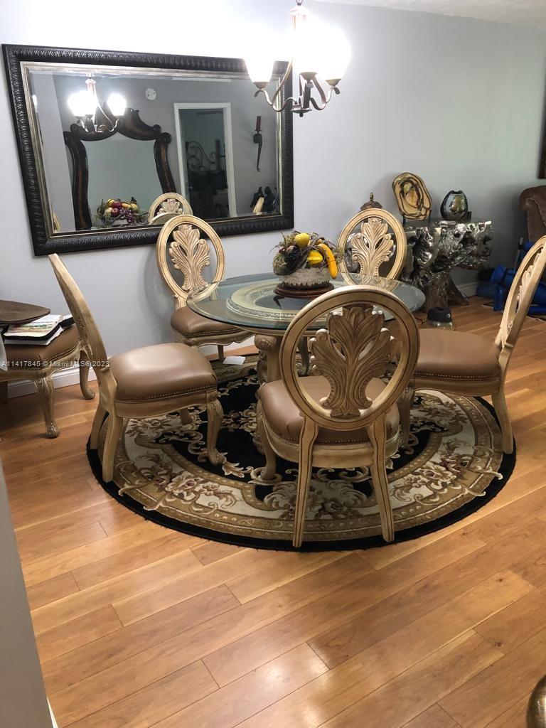 450 Commodore Drive, Unit 211 Plantation, FL 33325 - Photo 2 of 12 a view of a car in a room