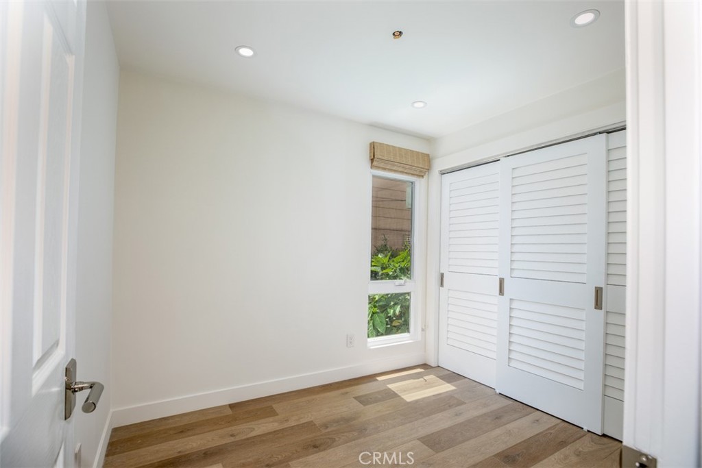 280 Dolphin Way Laguna Beach, CA 92651 - Photo 16 of 34 an empty room with windows and closet