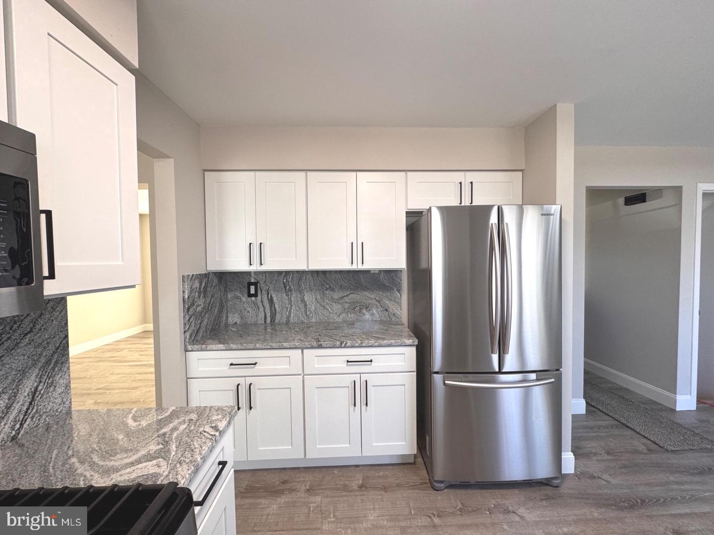 8 Framingham Road Beverly, NJ 08010 - Photo 5 of 35 Modern kitchen with sleek finishes.