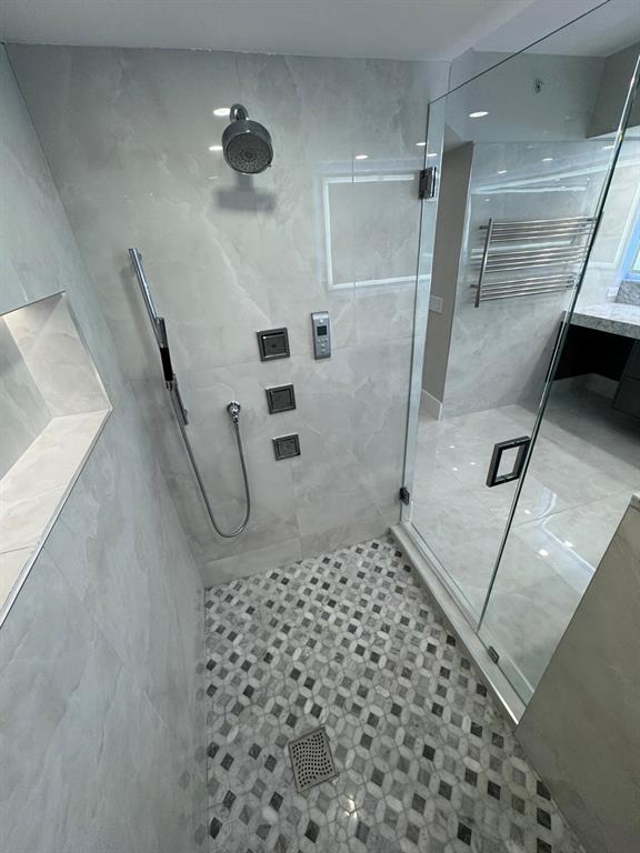 2051 Southeast 3rd Street, Unit 406 Deerfield Beach, FL 33441 - Photo 11 of 61 a bathroom with a shower