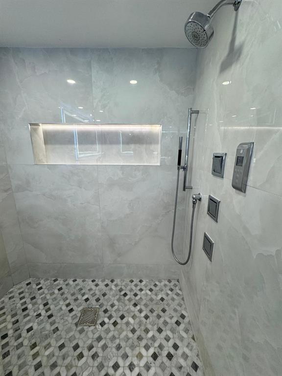 2051 Southeast 3rd Street, Unit 406 Deerfield Beach, FL 33441 - Photo 12 of 61 a bathroom with a shower