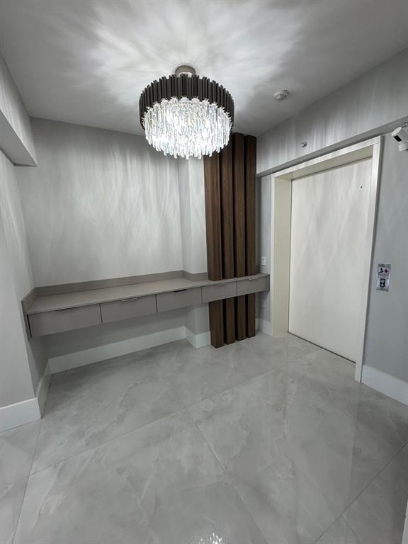 2051 Southeast 3rd Street, Unit 406 Deerfield Beach, FL 33441 - Photo 37 of 61 wooden floor in an empty room