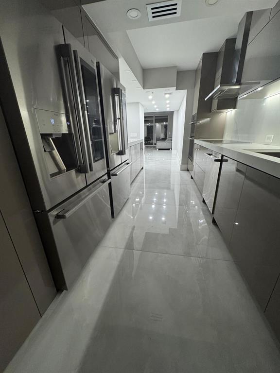 2051 Southeast 3rd Street, Unit 406 Deerfield Beach, FL 33441 - Photo 61 of 61 a view of a refrigerator a window and an empty room