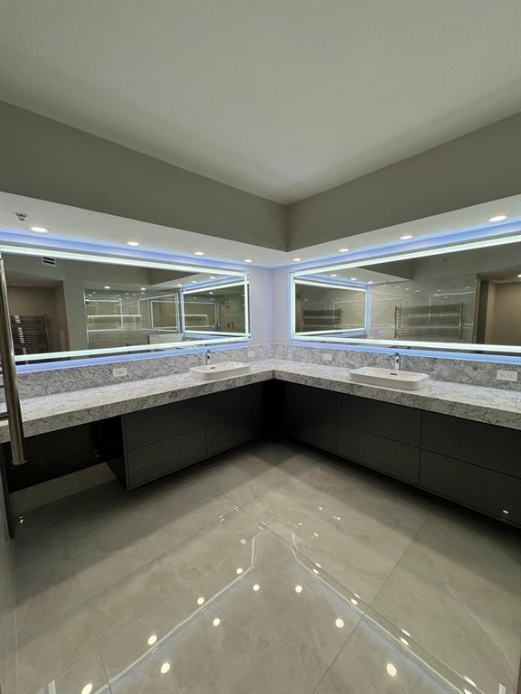 2051 Southeast 3rd Street, Unit 406 Deerfield Beach, FL 33441 - Photo 9 of 61 a living room with a large window