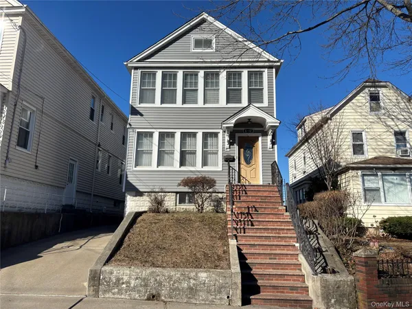 a front view of a house with a porch