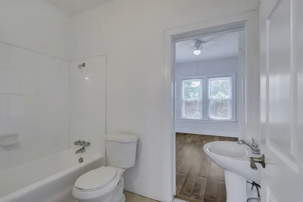 a bathroom with a sink and a toilet