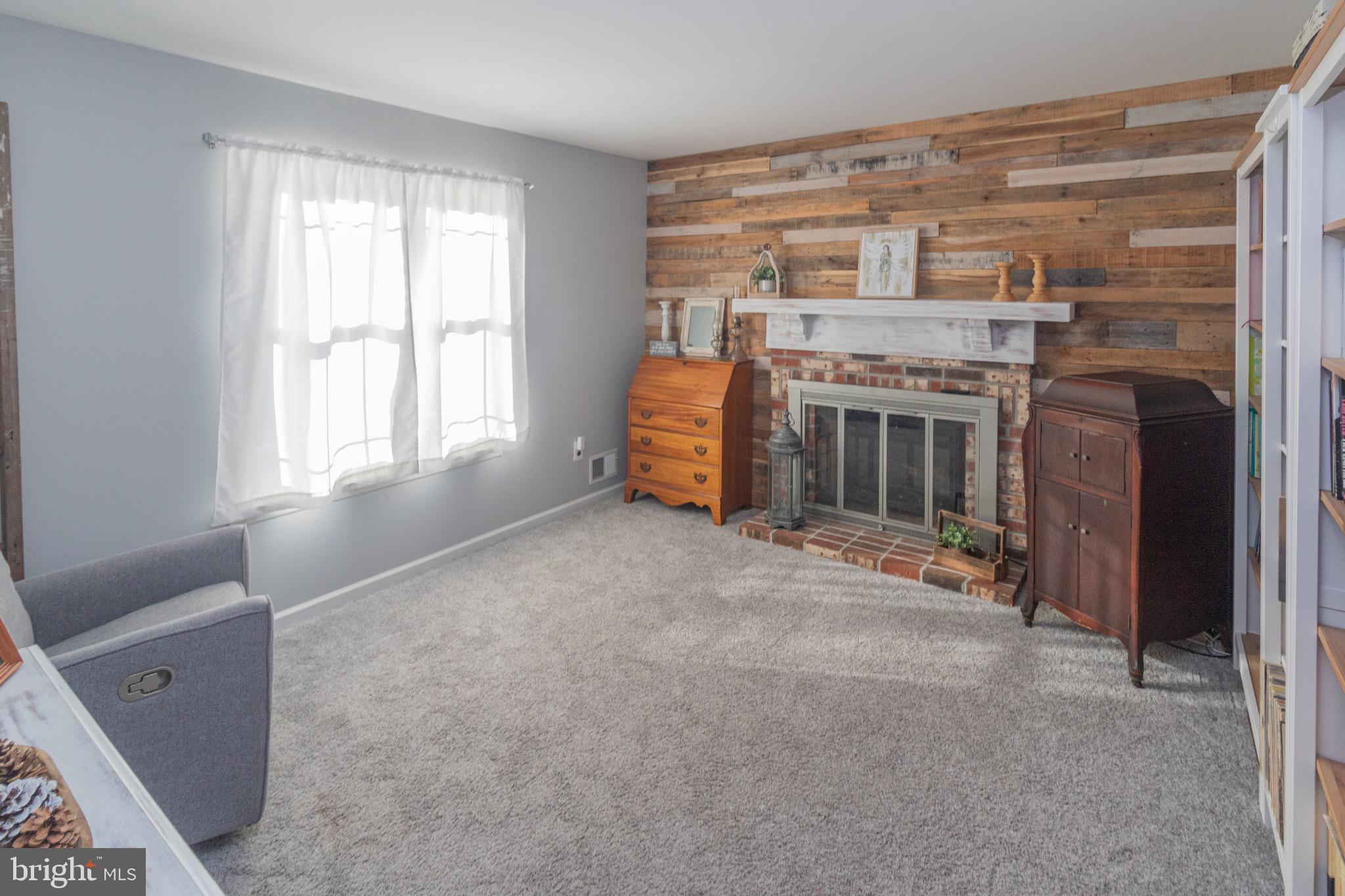 70 Tarnsfield Road Westampton, NJ 08060 - Photo 22 of 35 Cozy living space with rustic charm.