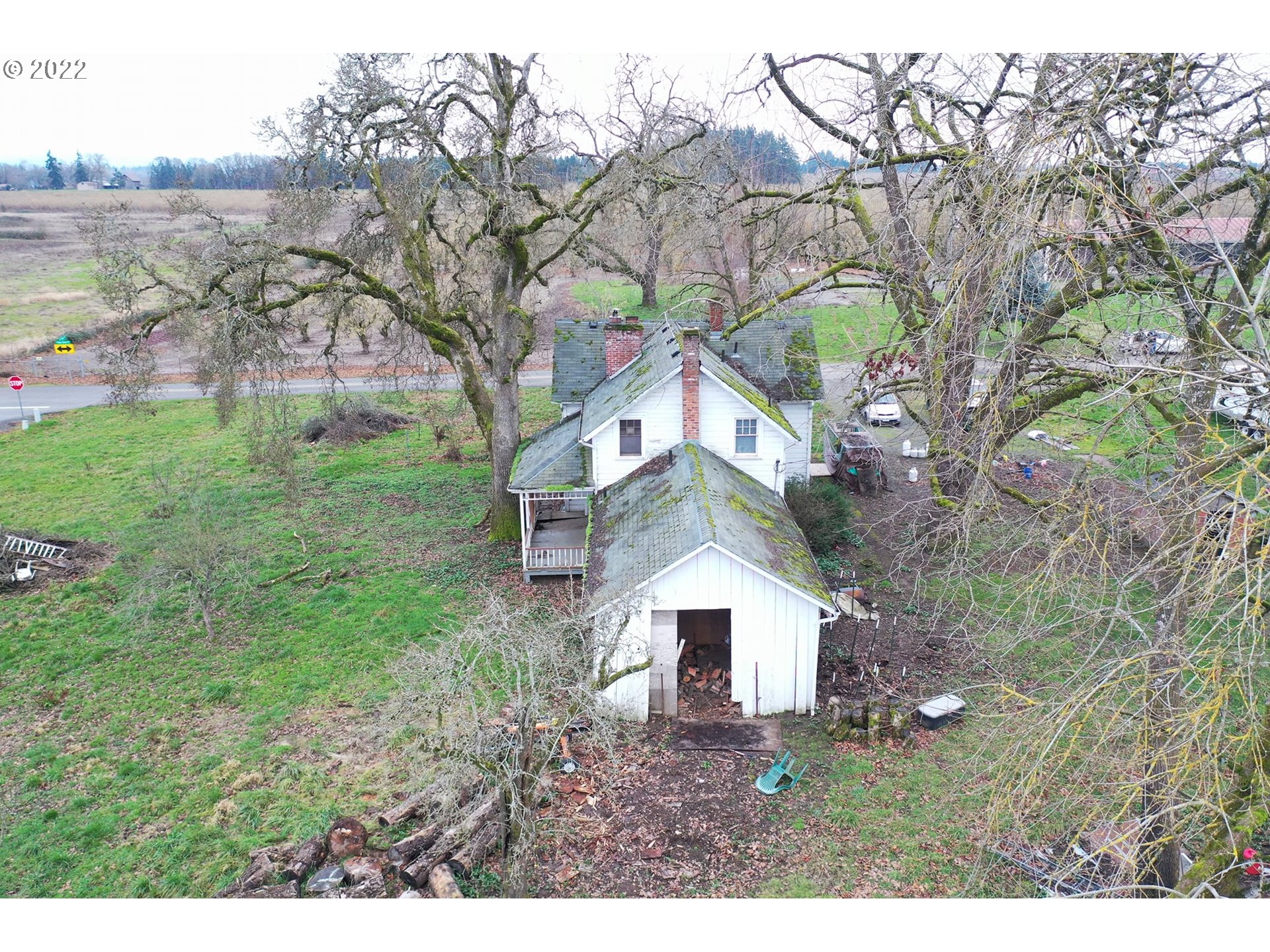 11713 South Riggs Damm Road Canby, OR 97013 - Photo 12 of 28 a front view of a house with garden
