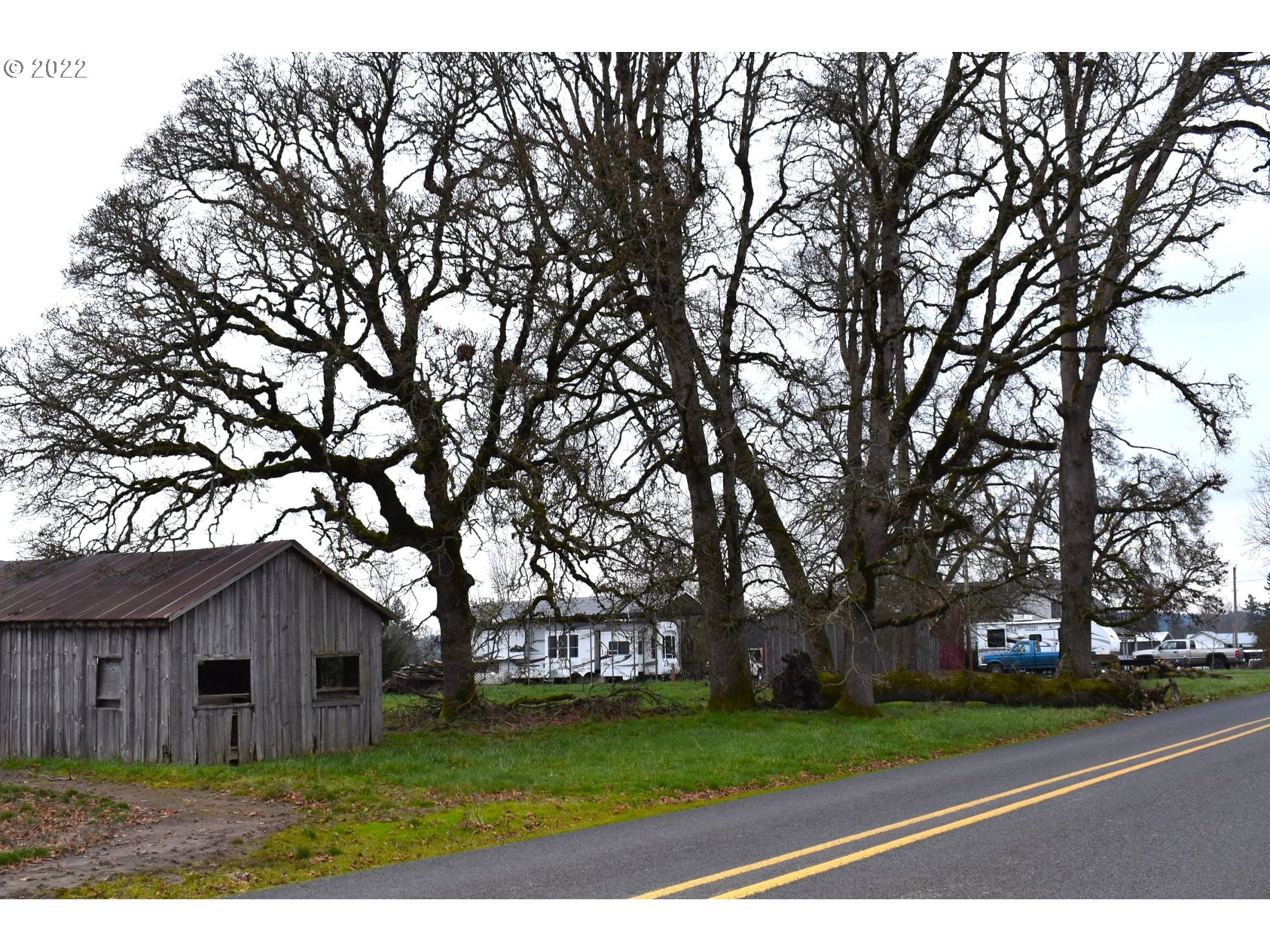 11713 South Riggs Damm Road Canby, OR 97013 - Photo 20 of 28 a view of a yard in front of a house