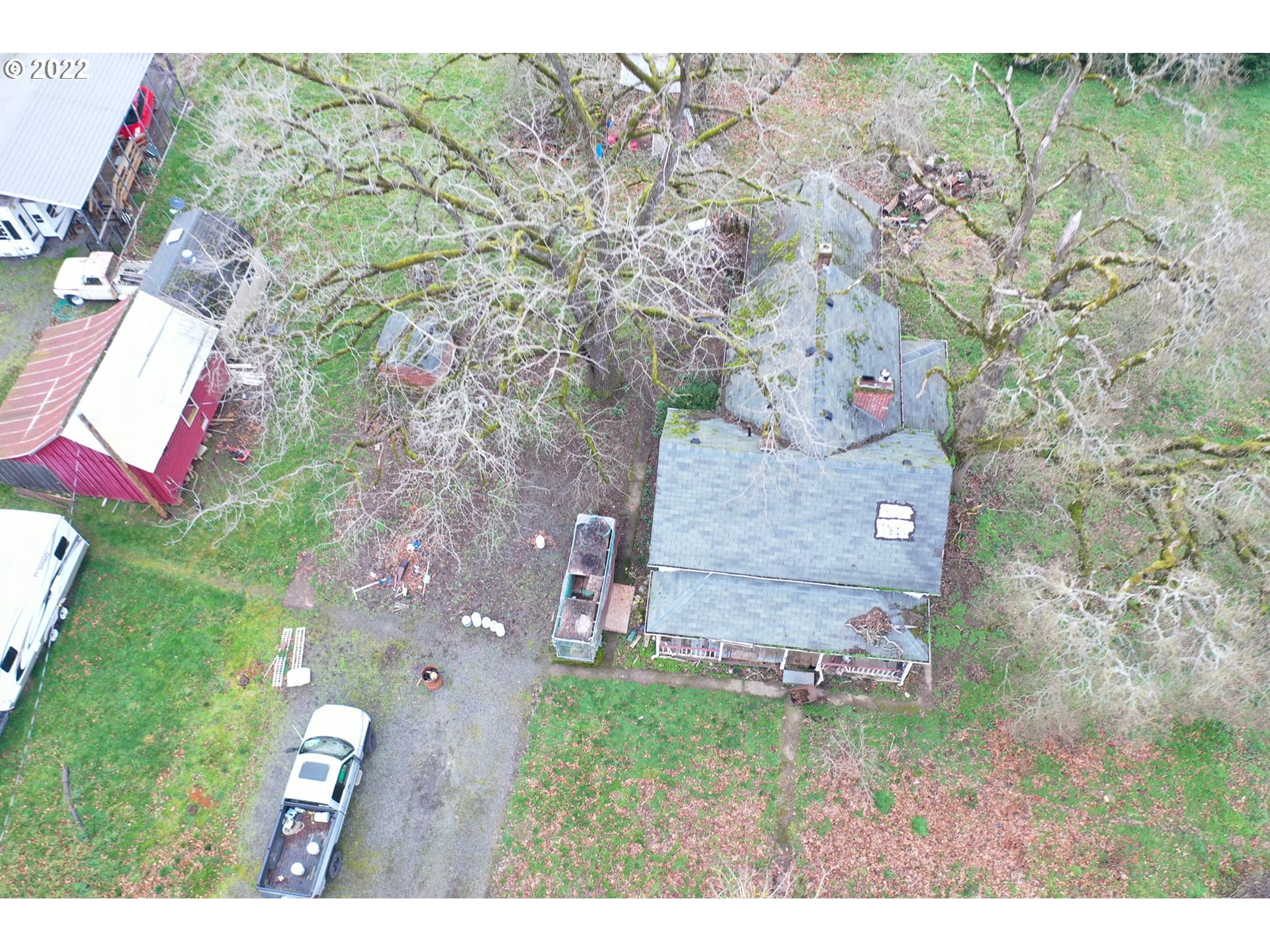 11713 South Riggs Damm Road Canby, OR 97013 - Photo 2 of 28 a aerial view of a house with a yard and large tree
