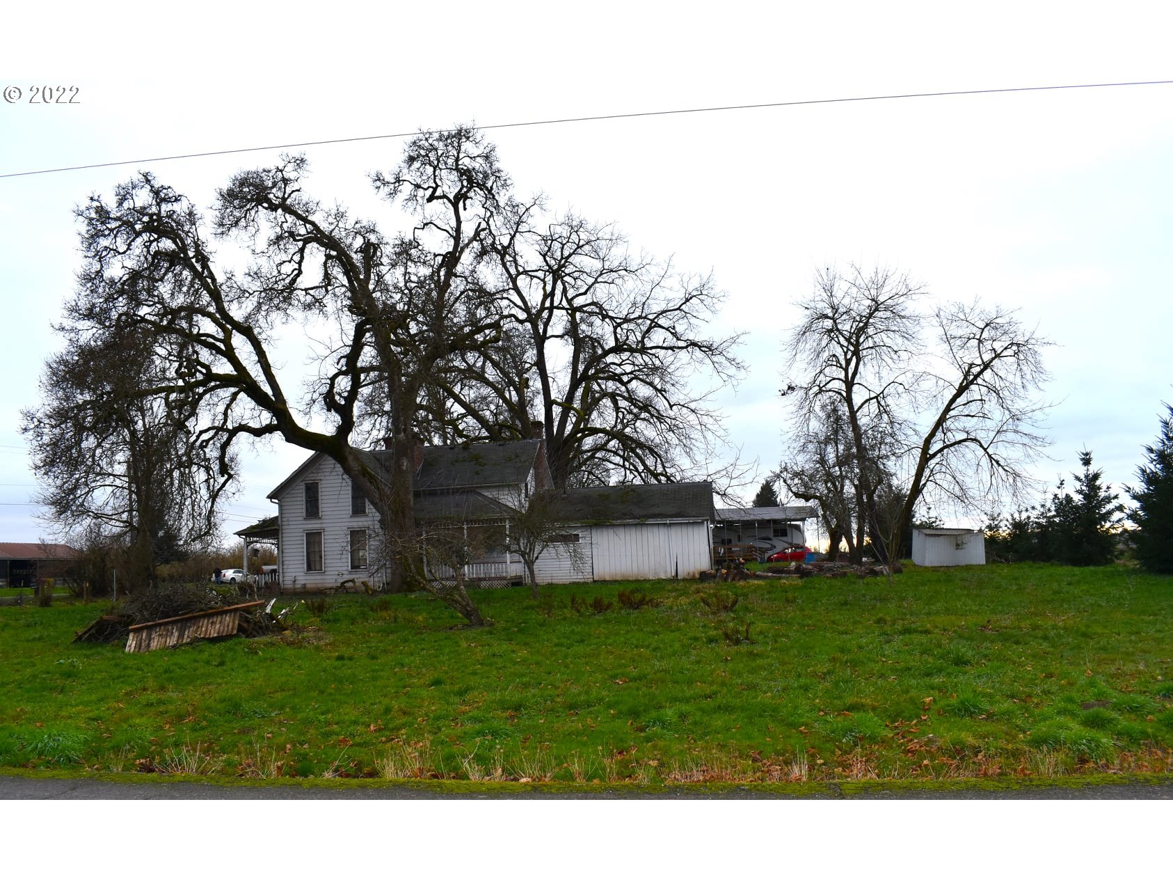 11713 South Riggs Damm Road Canby, OR 97013 - Photo 22 of 28 a backyard of a house with lots of green space