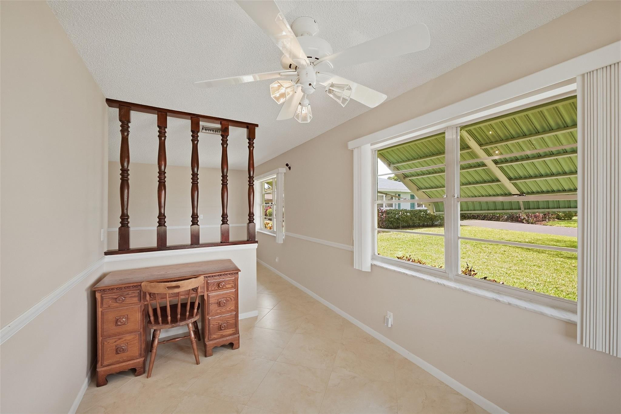 602 Hummingbird Lane, Unit 602 Delray Beach, FL 33445 - Photo 14 of 31 a view of an empty room with a window