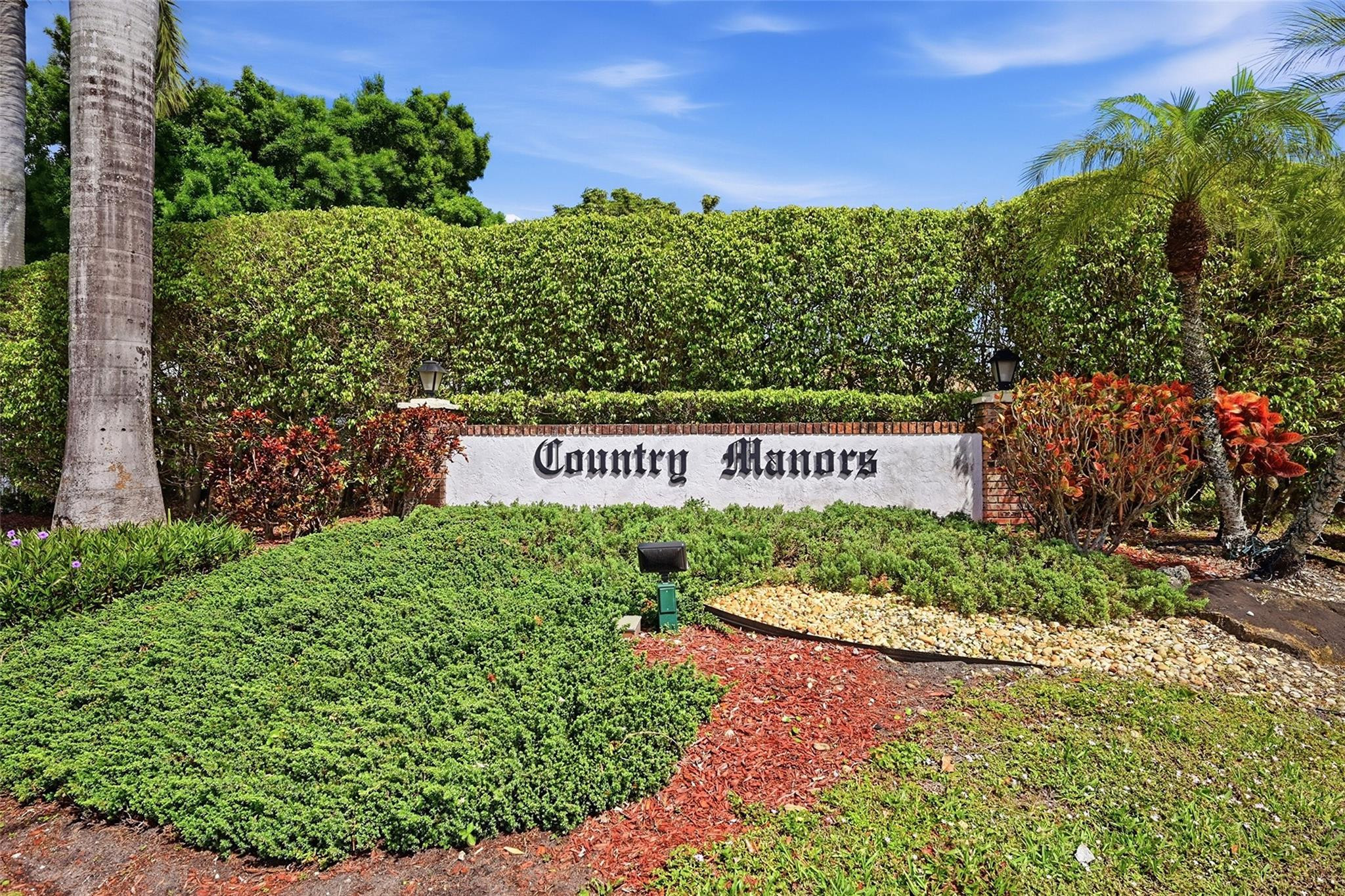 602 Hummingbird Lane, Unit 602 Delray Beach, FL 33445 - Photo 31 of 31 a sign on the side of a building