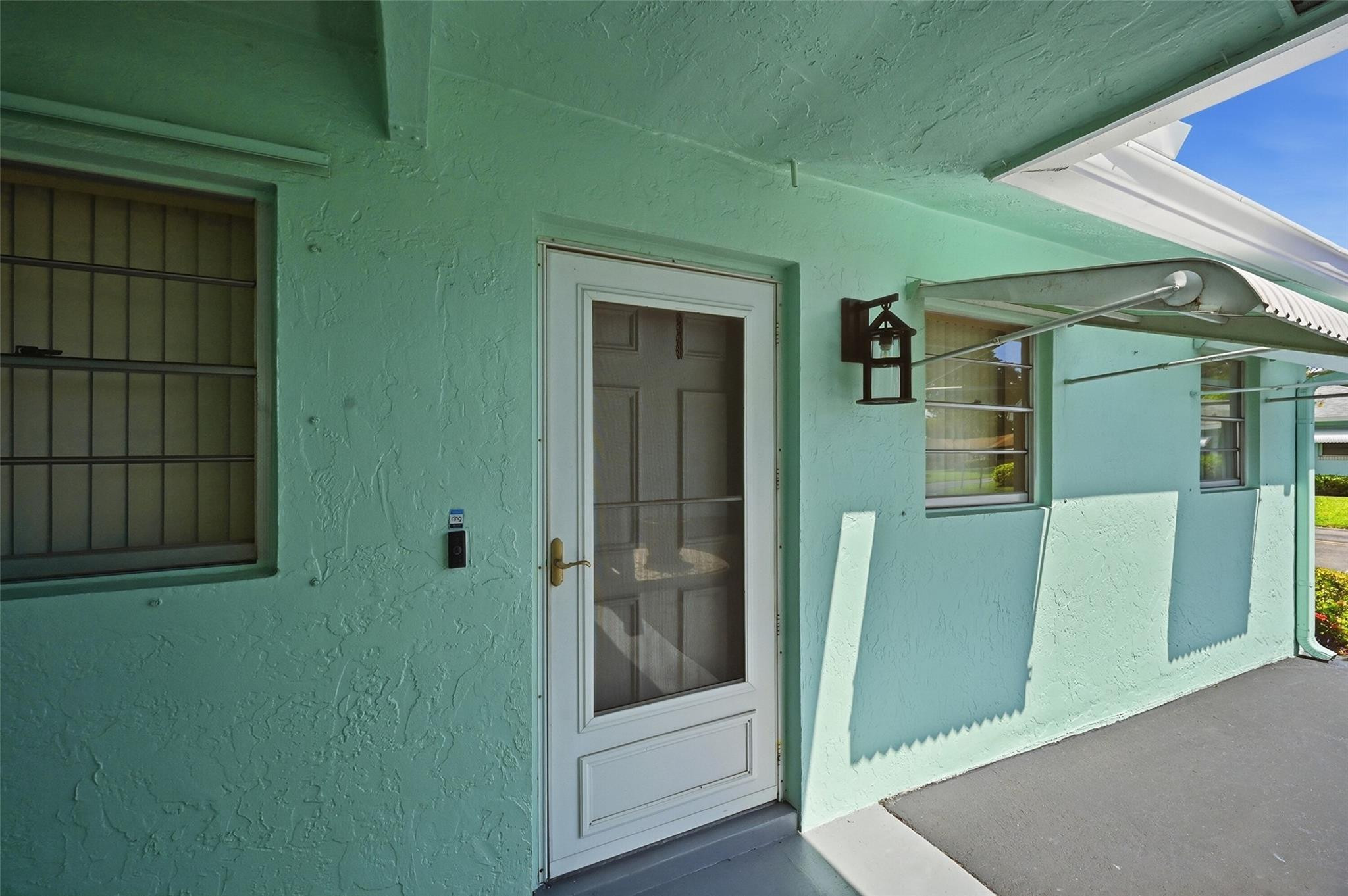 602 Hummingbird Lane, Unit 602 Delray Beach, FL 33445 - Photo 8 of 31 a view of front door and porch