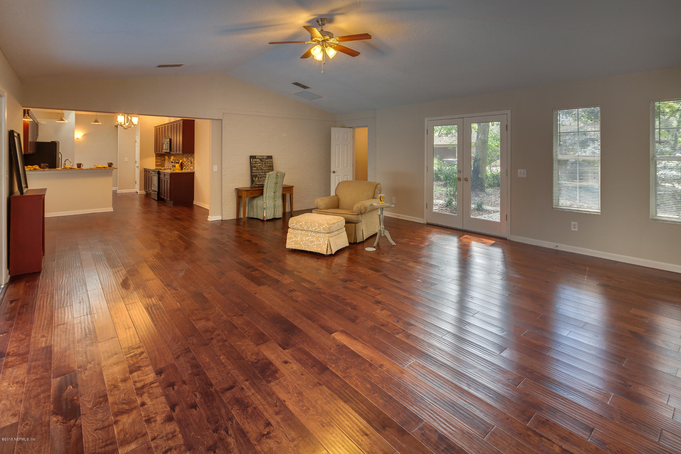 4265 Wicks Branch Road St. Augustine, FL 32086 - Photo 14 of 35 a living room with furniture and wooden floor