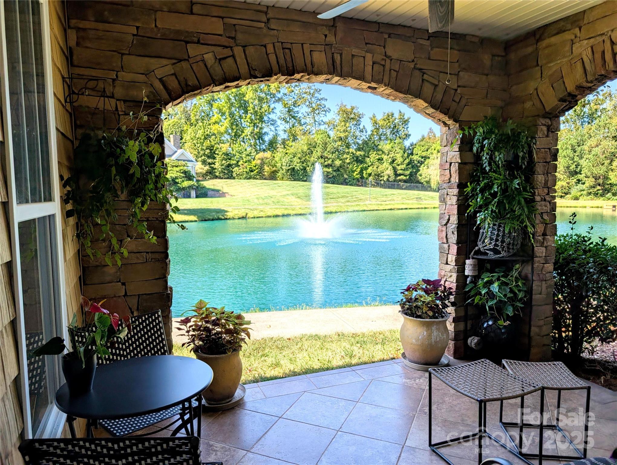2666 Bellasera Way Matthews, NC 28105 - Photo 27 of 31 a view of swimming pool from a outdoor seating
