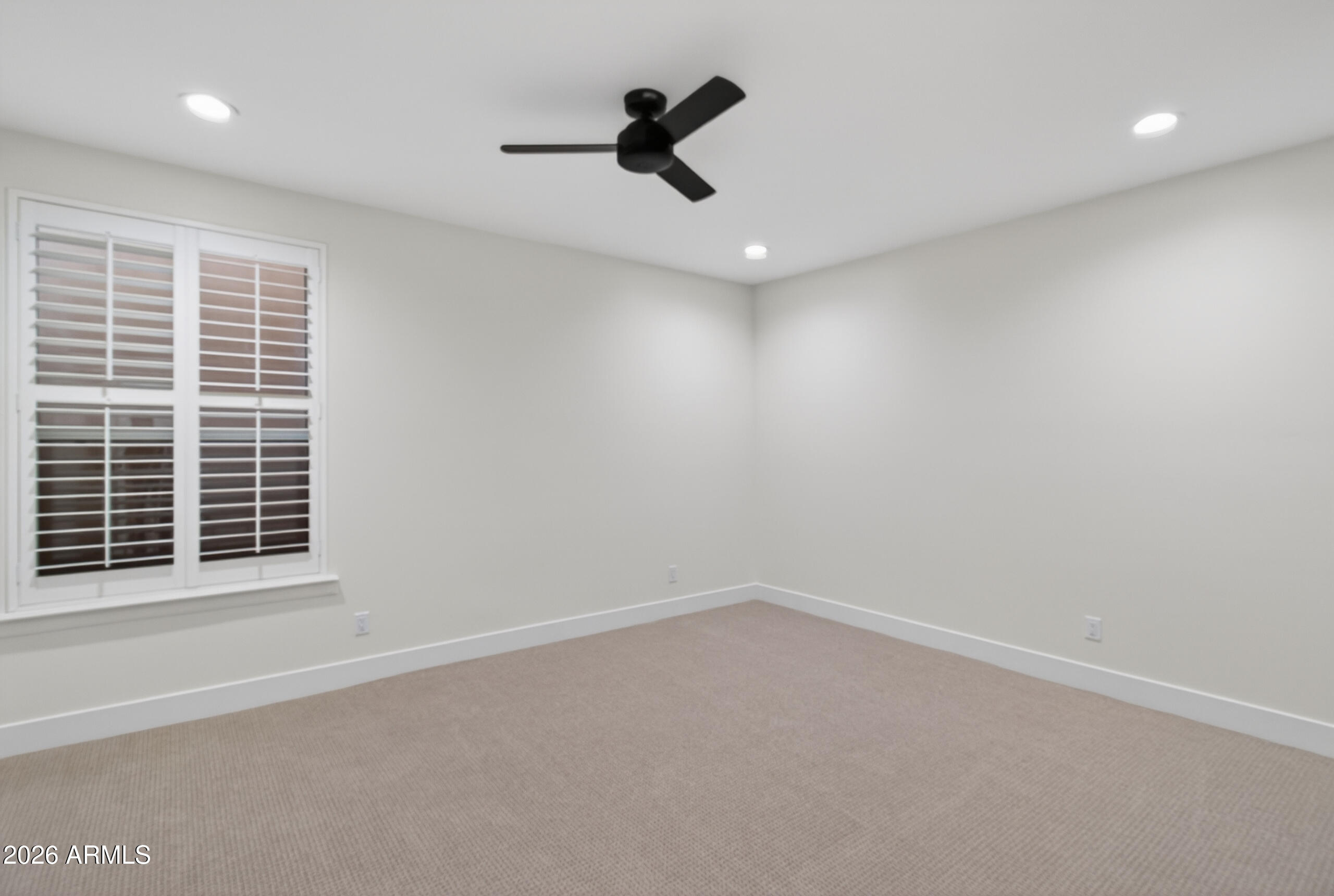 2677 East Queen Creek Road Gilbert, AZ 85297 - Photo 70 of 128 a view of an empty room with a window