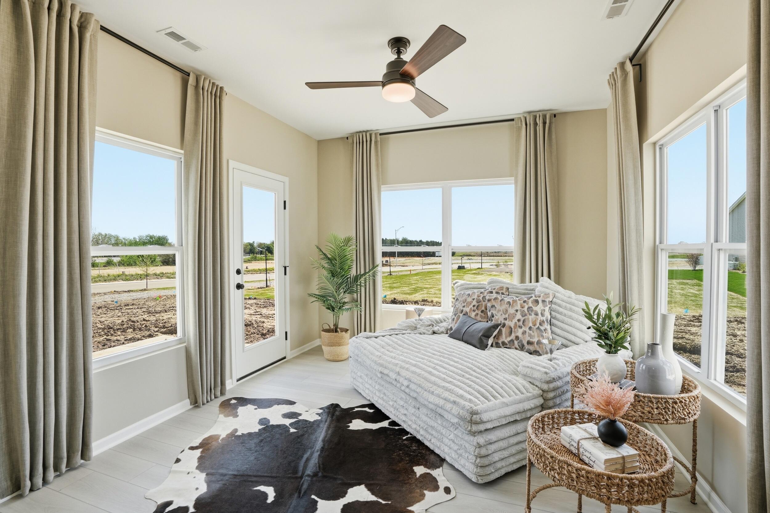 5691 Ruby Road, Unit 3553 Lowell, IN 46356 - Photo 11 of 20 a bedroom with a bed and a large window with outer view