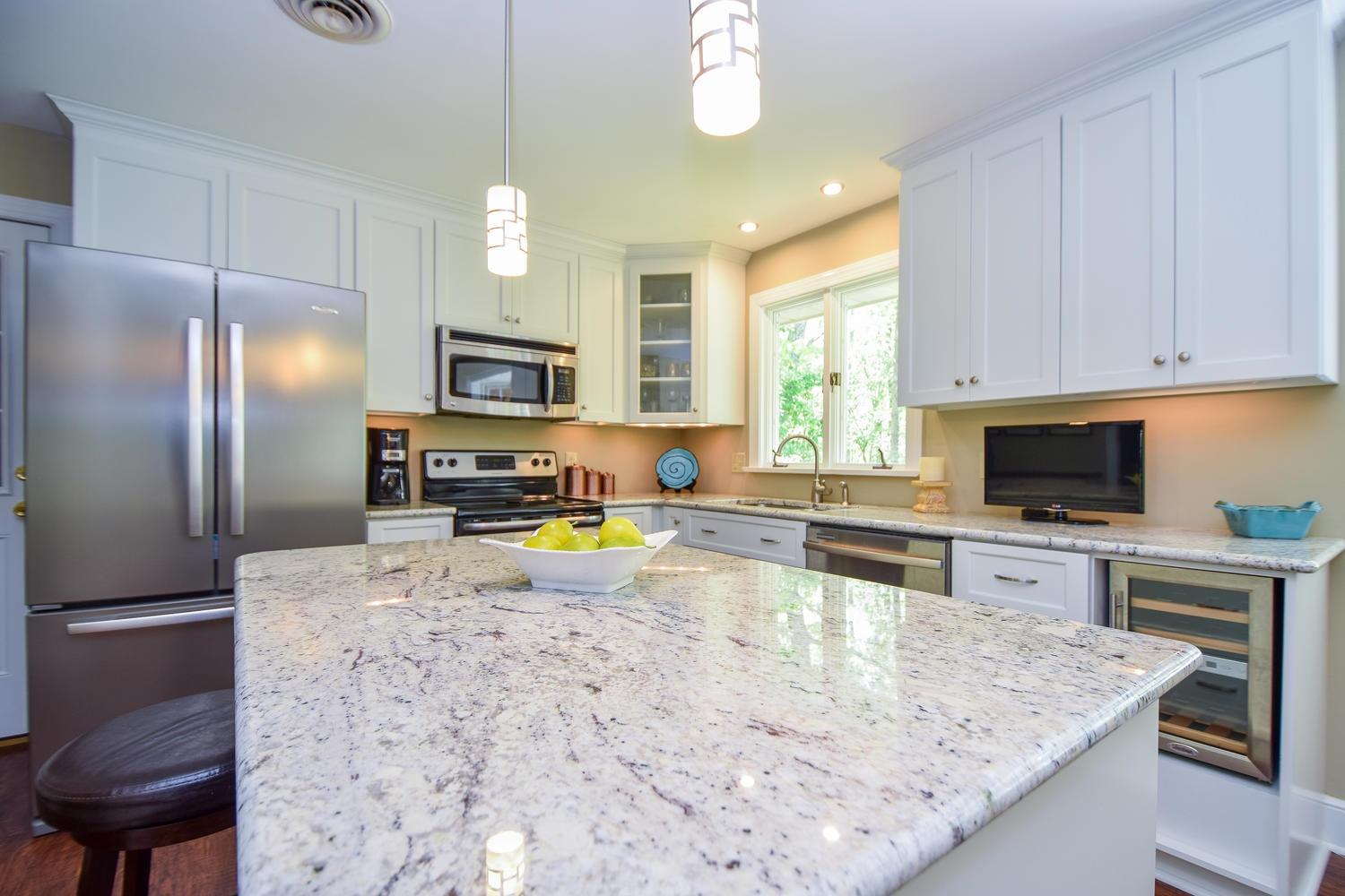 5105 Falcon Ridge Road Roanoke, VA 24018 - Photo 14 of 32 a kitchen with sink refrigerator and microwave