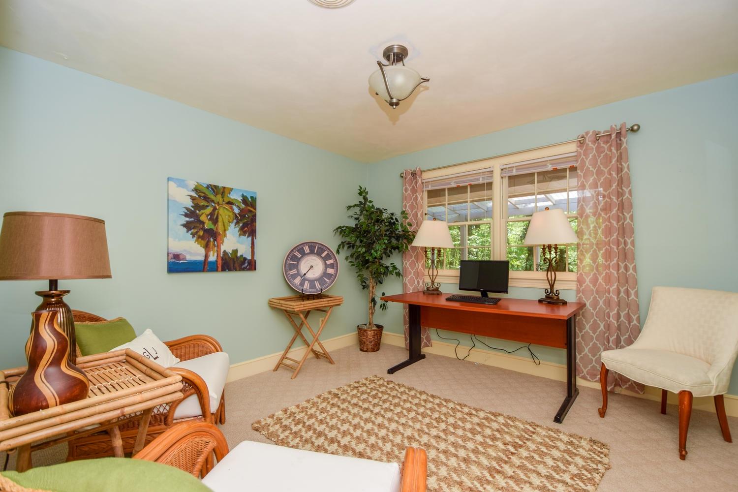 5105 Falcon Ridge Road Roanoke, VA 24018 - Photo 22 of 32 a living room with furniture a rug and a window