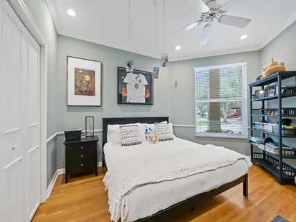a bedroom with a workspace