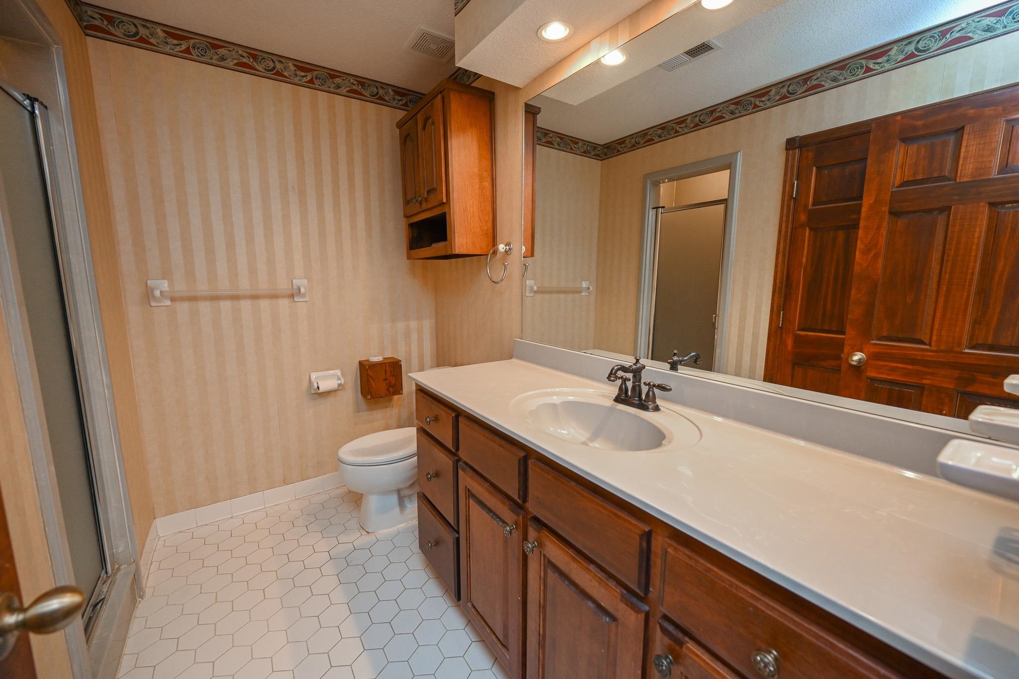 3746 Broadway Road Bartlett, TN 38135 - Photo 18 of 39 Primary bath with large vanity, linen closet and shower.