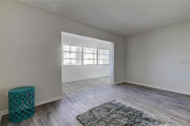 a view of an empty room and window