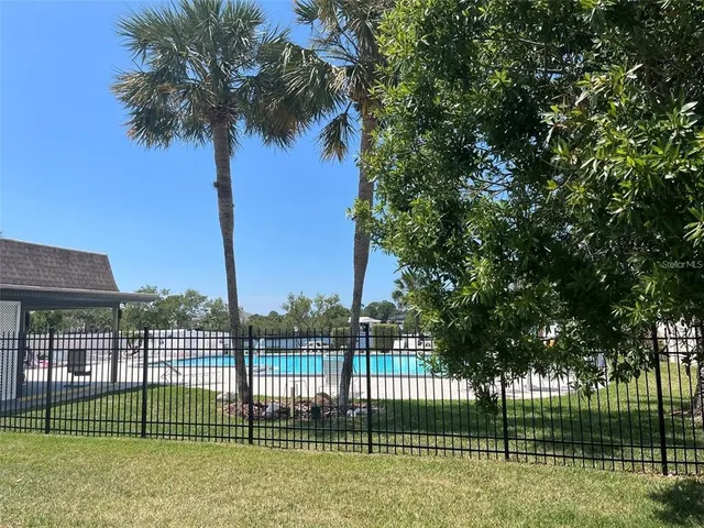 a view of a garden with a bench
