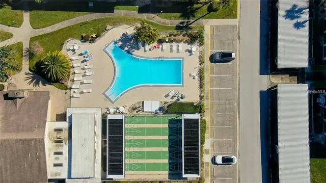 an aerial view of residential building with outdoor space