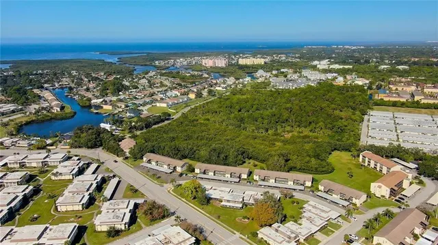 an aerial view of a city with lots of residential buildings