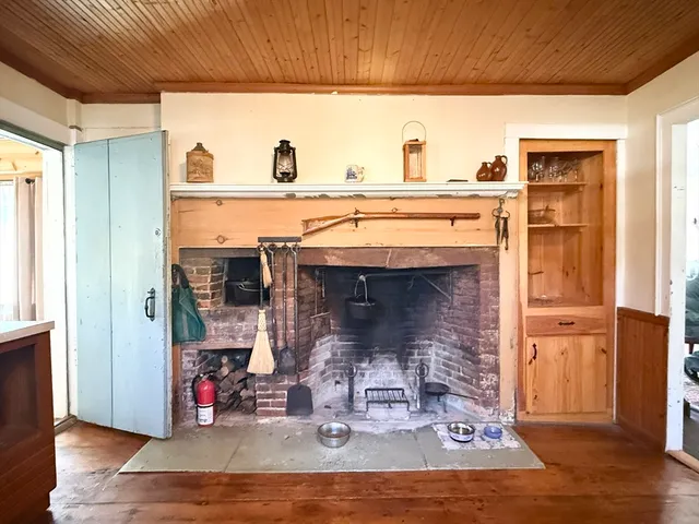 a kitchen with a refrigerator stove and sink