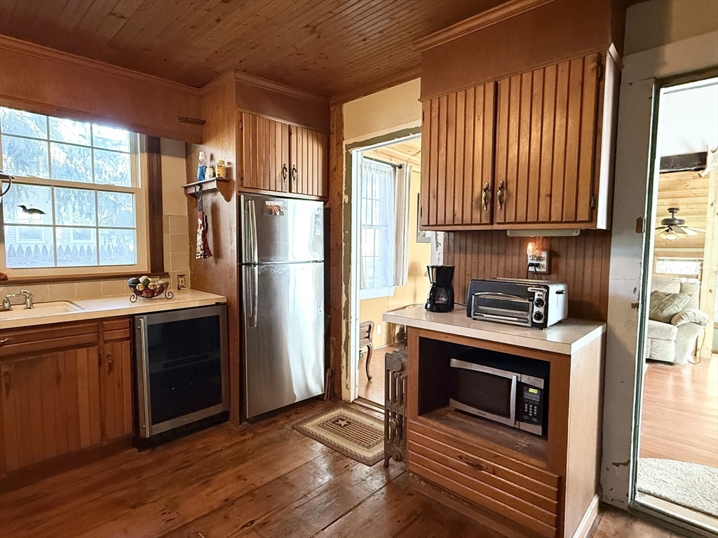 334 Elm Street West Springfield, MA 01089 - Photo 13 of 42 a kitchen with a refrigerator stove and sink